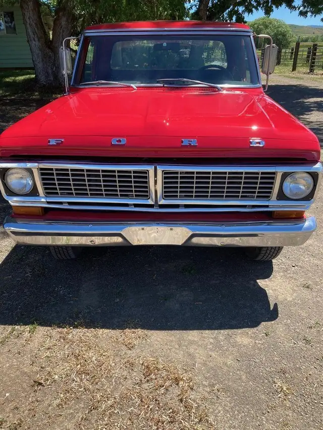 Red vintage Ford truck, front view, finished